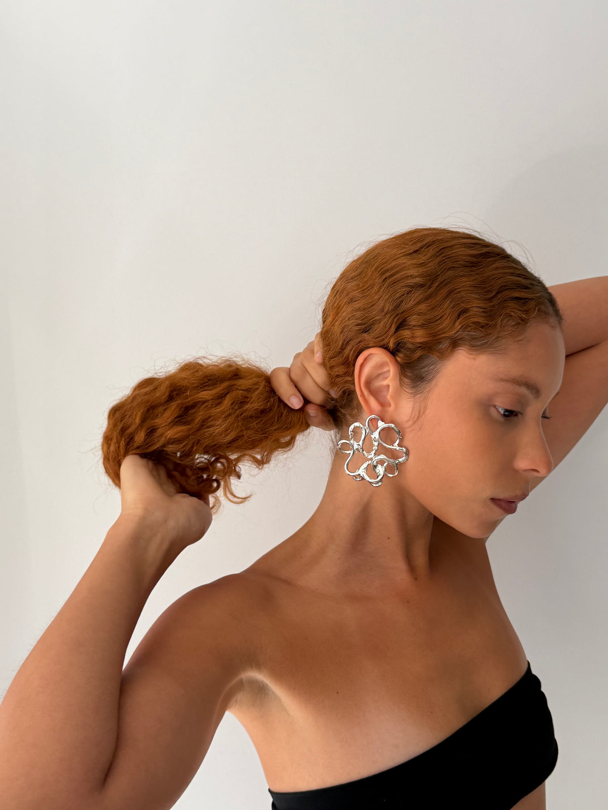 YNES earrings