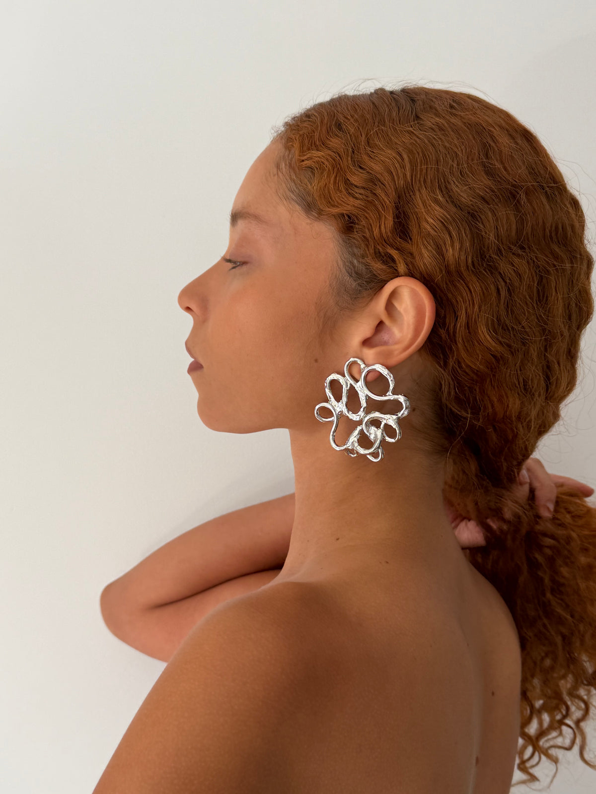 YNES earrings