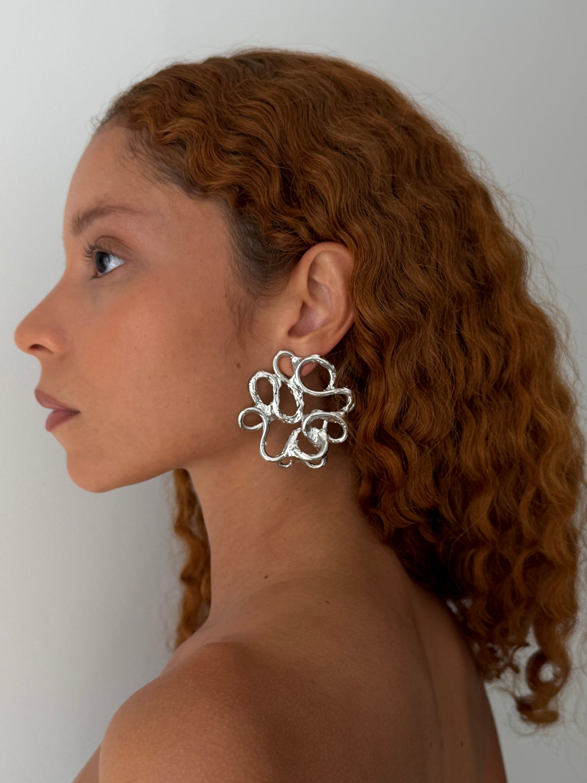 YNES earrings