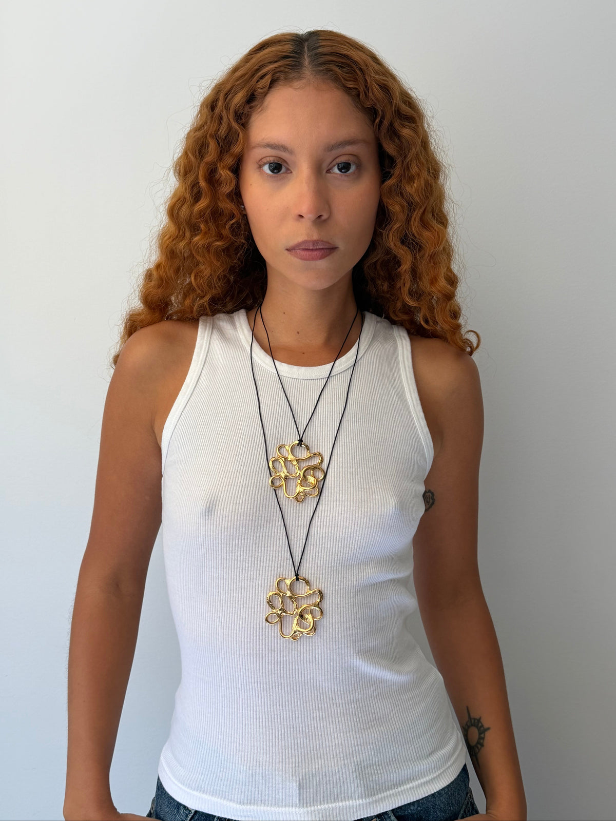 YNES single pendant necklace